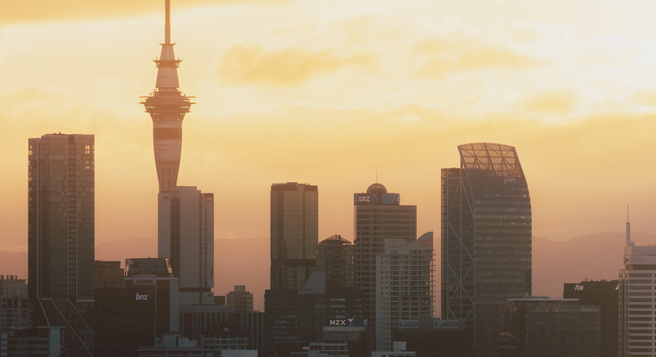 Auckland's skyline and Sky Tower at sunset