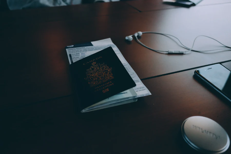 A passport and travel documents on a desk